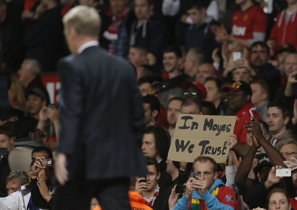 Manchester United fan with In Moyes We Trust Placard