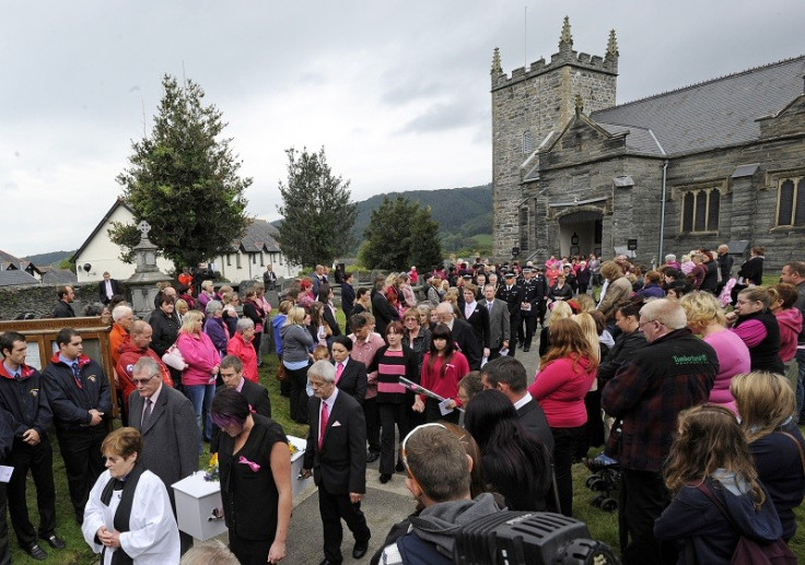 The coffin of April Jones is carried from St Peter's Church after her funeral service in Machynlleth PIC: Reuters