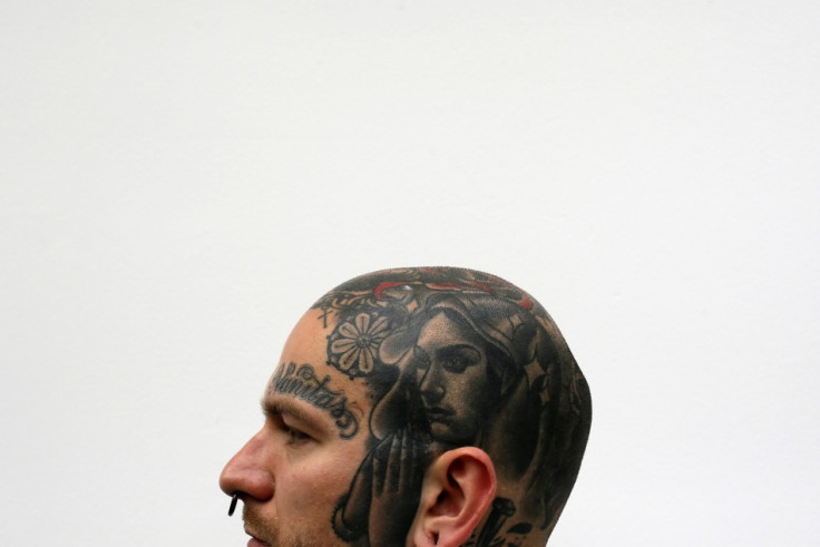 Religious symbolism in tattoos is still a popular motif.