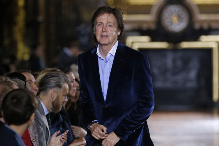 Singer Paul McCartney attends the Spring/Summer 2014 women's ready-to-wear fashion show designed by his daughter British designer Stella McCartney. (Photo: REUTERS/Benoit Tessier)