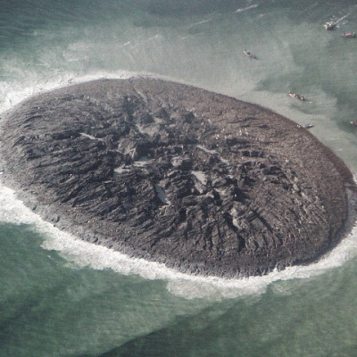 An animated aerial photo of an island that has been formed offshore in Pakistan following a recent 7.7 magnitude earthquake. (Photo:  National Institute of Oceanography/NASA)