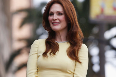 Actress Julianne Moore waits before unveiling her star on the Walk of Fame in Hollywood, California October 3, 2013. (Photo: REUTERS/Mario Anzuoni)