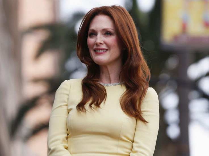 Actress Julianne Moore waits before unveiling her star on the Walk of Fame in Hollywood, California October 3, 2013. (Photo: REUTERS/Mario Anzuoni)
