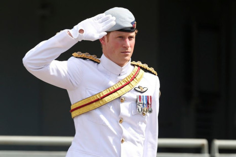 Dressed in an all-white Navy outfit, Prince Harry attended the International Fleet Review in Sydney on 5 October. (Photo: REUTERS)