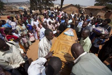 Mourners at the funeral of one of the victims of the 2010 kampala terror attack.