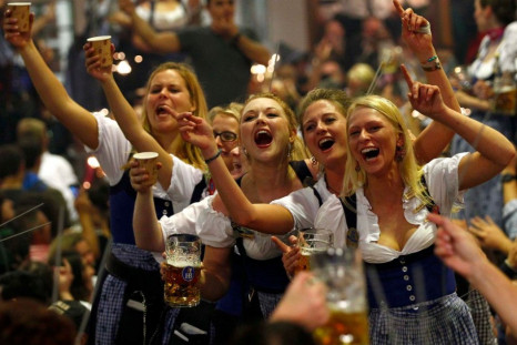Oktoberfest waitresses toast while they celebrate the end of the world's biggest beer festival, the 180th Oktoberfest, in Munich on 6 October. (Photo: Reuters)