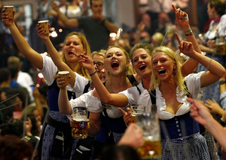 Oktoberfest waitresses toast while they celebrate the end of the world's biggest beer festival, the 180th Oktoberfest, in Munich on 6 October. (Photo: Reuters)