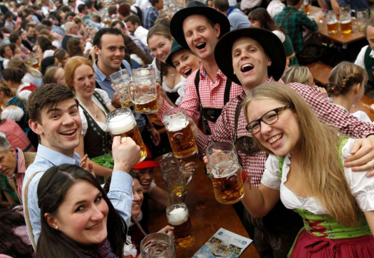 Visitors from London cheer with mugs of beer during the last day of the 180th Oktoberfest in Munich. (Photo: Reuters)
