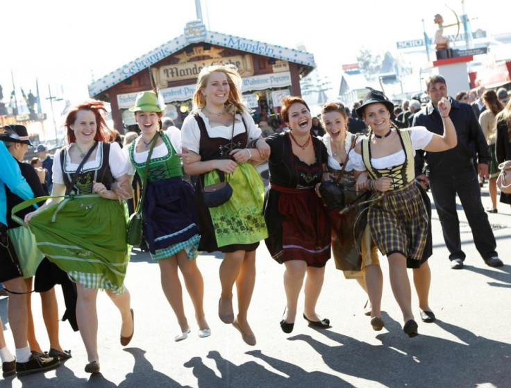Young women from Baden-Wuerttemberg pose while wearing Bavarian dirndls at Munich's 180th Oktoberfest. (Photo: Reuters)