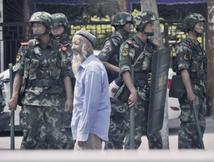 Xinjiang police arrest Muslim