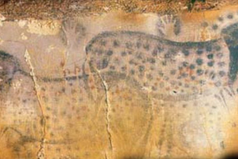 Four of the six black hand stencils associated with the Spotted Horse mural in the prehistoric Pech Merle cave in France were made my females, according to a study. (Photo: Dean Snow/Pennsylvania State University)