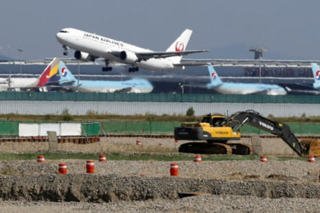 A Japan Airlines airplane takes off