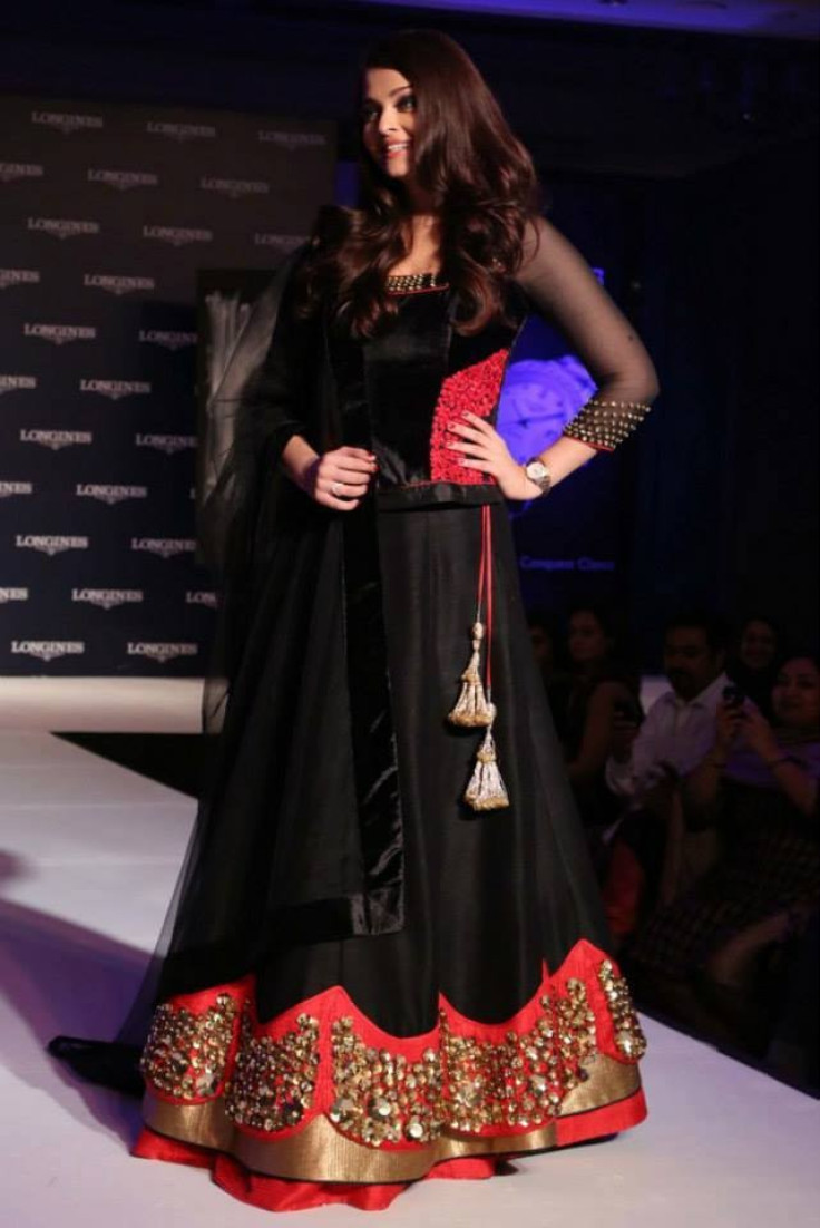 Aishwarya Rai Bachchan looked ravishing in a red and black lehenga (Facebook/AshOfficial)