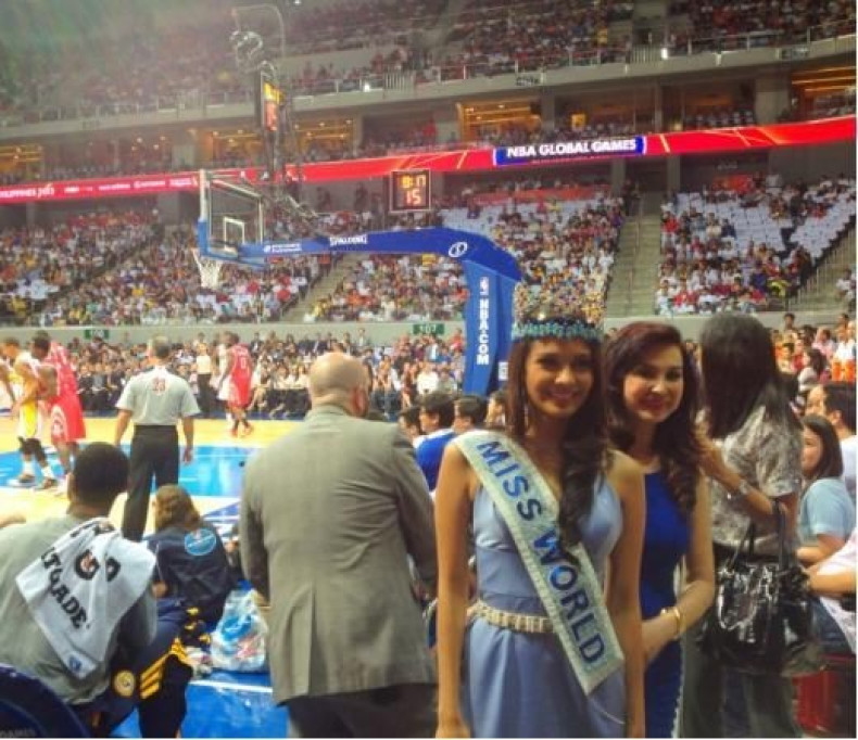Megan Young takes courtside seats at NBA game in Manila on 10 October. (Photo: Miss World organisation)