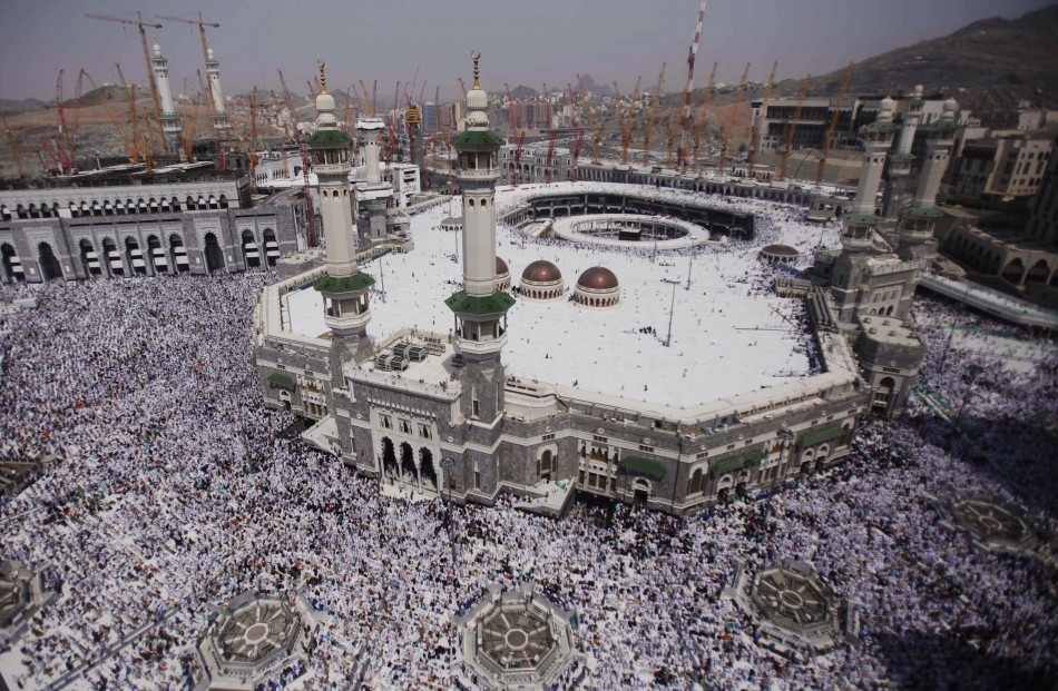 Muslim pilgrims attend Friday prayers at the Grand mosque in the holy city of Mecca ahead of the annual Hajj pilgrimage