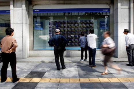 Asian markets finish the week higher