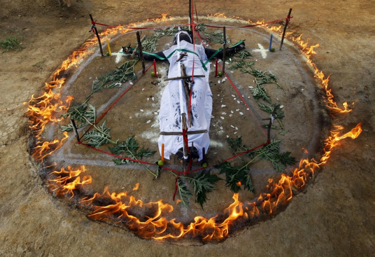 A woman undergoing an exorcism in La Cumbre, Colombia.