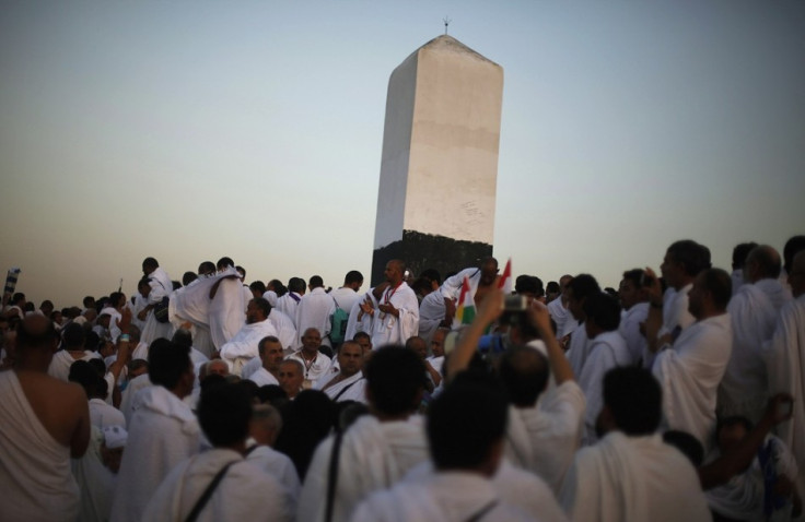 Muslim pilgrims gather atop Mount Mercy on the plains of Arafat