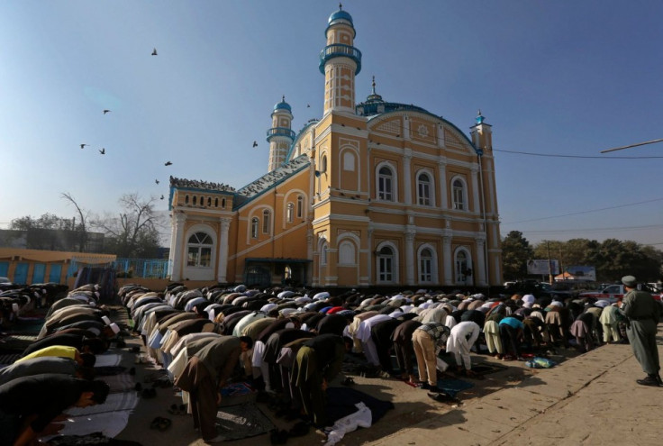 Afghan men attend Eid al-Adha prayers in Kabul. (Photo: Reuters)