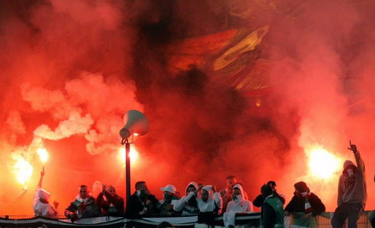 Polish football hooligans make their presence felt at a Legia Warsaw v Lech Poznan match PIC: Reuters