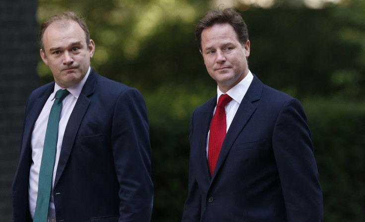 Energy and Climate Secretary Ed Davey (L) and Deputy Prime Minister Nick Clegg at 10 Downing Street in London . Britain's government is under pressure to battle with Labour over energy price hikes (Photo: Reuters)