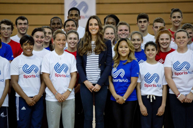 Kate Middleton poses for a group photograph with young athletes. (Photo: REUTERS)