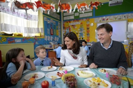 Nick Clegg and wife visiting a primary school
