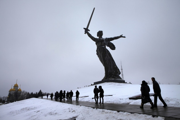 People walk at the Mamayev Kurgan (Mamayev Hill) World War Two memorial complex, with the statue of Mother Homeland in the background during celebrations in the city of Volgograd People walk at the Mamayev Kurgan (Mamayev Hill) World War Two memorial complex, with the statue of Mother Homeland in the background during celebrations in the city of Volgograd