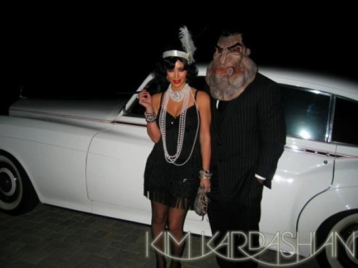 Kardashian arrives as a flapper  [Kim Kardashian/Celebbuzz]
