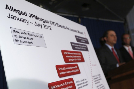 A chart showing the names of two derivative traders Javier Martin-Artajo and Julien Grout is seen during a news conference by US Attorney for the Southern District of New York announcing the unsealing of in August (Photo: Reuters)