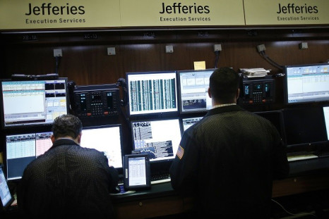 Trading specialists from Jefferies work on the floor of the New York Stock Exchange (Photo: Reuters)