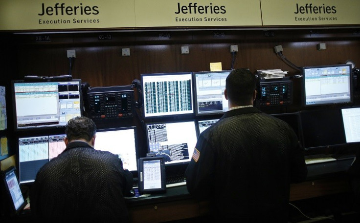 Trading specialists from Jefferies work on the floor of the New York Stock Exchange (Photo: Reuters)