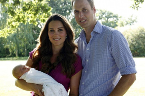 Kate Middleton, Prince William and Prince George in their first official family photo. George's first official portrait will be taken at his christening on 23 October. (Photo: Clarence House)