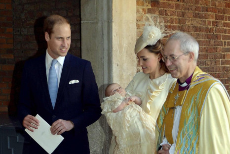 Britain's Catherine, Duchess of Cambridge walks with her husband Prince William and Justin Welby as she carries her son Prince George after his christening at St James's Palace in London