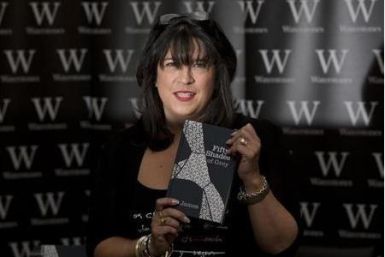 Fifty Shades of Grey producer Michael De Luca said a new comer will be perfect to play Christian Grey. EL James holding her best selling book. (Reuters)