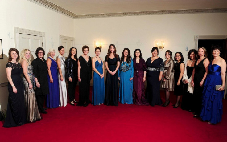 Duchess of Cambridge poses for a picture with members of the board of 100 Women in Hedge Funds at a gala dinner. (Photo: Reuters)