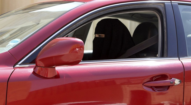 A female driver defies the ban in Saudi Arabia.
