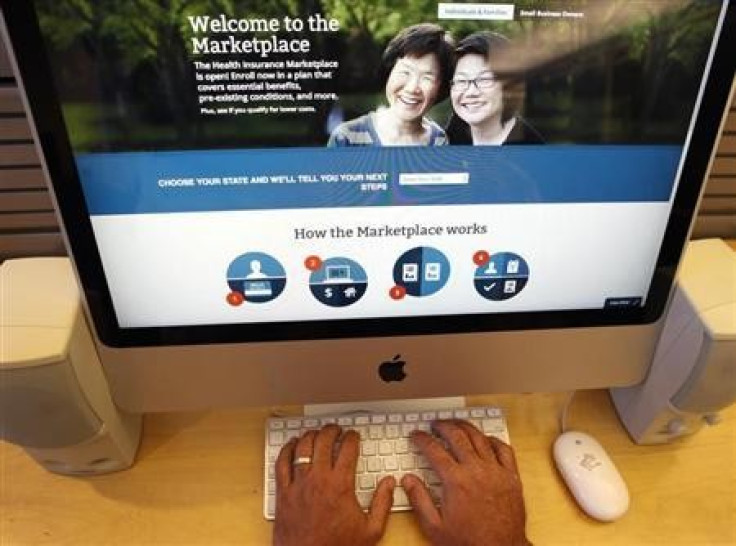 A man looks over the Affordable Care Act (commonly known as Obamacare) signup page on the HealthCare.gov website in New York in this October 2, 2013 photo illustration.