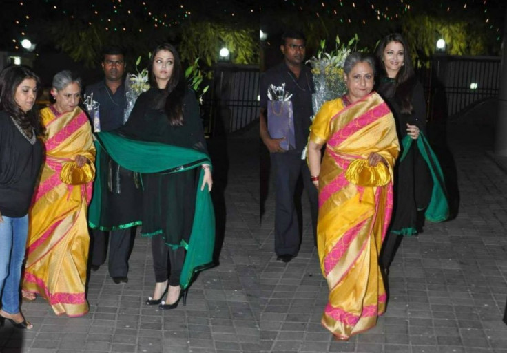 Aishwarya Rai escorts her elderly mother-in-law.  (Photo: AshOfficial/info/Facebook)