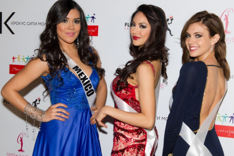 Cynthia Duque, Miss Universe Mexico 2013; Riza Santos, Miss Universe Canada 2013; and Erin Brady, Miss USA 2013; pose for a photo during arrivals for the National Gift Auction at Crocus City Mall on October 30, 2013. (Photo: MIss Universe Organization L.P
