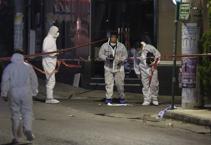 Forensic experts search for evidence