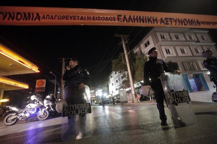 Police outside Golden Dawn office where two members were killed.