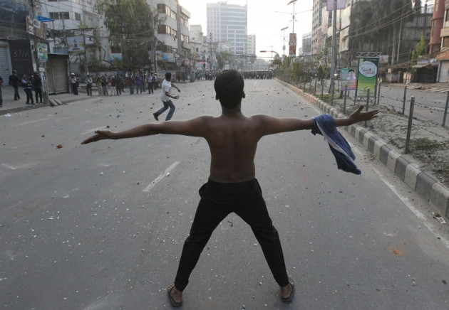 Jamaat-e-Islami supporters clash with police in Dhaka, Bangladesh on March 11, 2013. Jamaat-e-Islami supporters clash with police in Dhaka, Bangladesh on March 11, 2013.