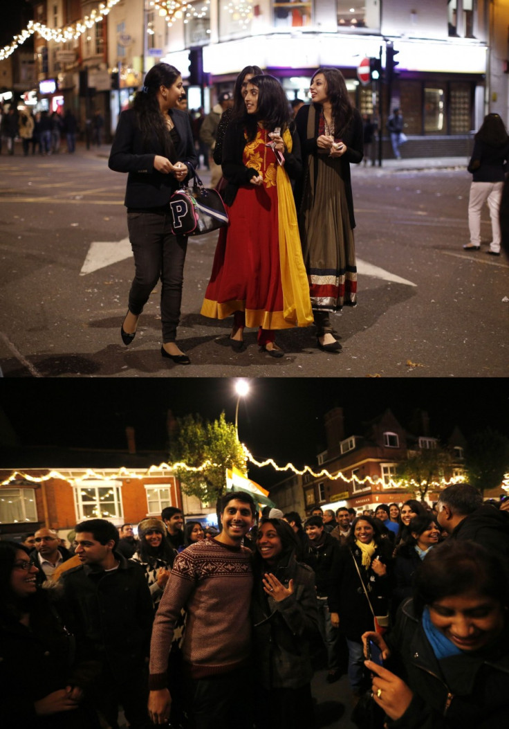 Girls dressed in traditional Indian outfits walk the golden mile during Diwali celebrations in Leicester. (Photo: REUTERS/Darren Staples)