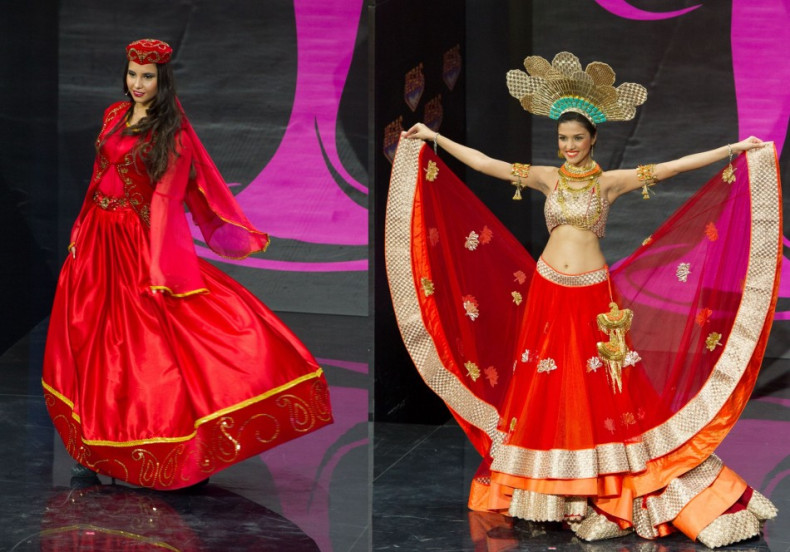 Miss Universe 2013 contestants dazzle in red: Miss India, Manasi Moghe (R) and Miss Azerbaijan. (Photo: MIss Universe Organization L.P., LLLP)