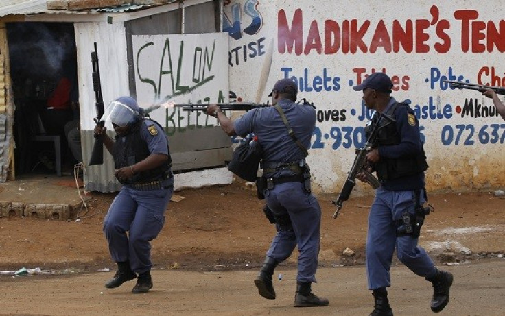 Vigilante attacks and protests are common in South African townships (Reuters)