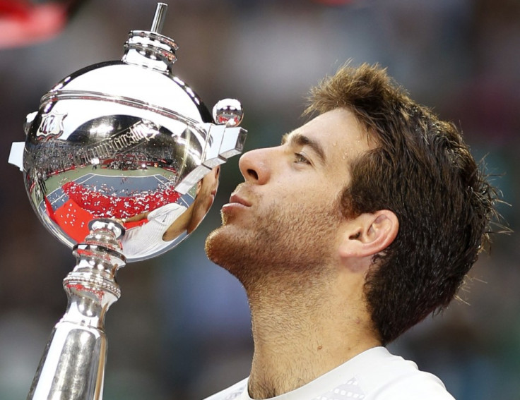 Juan Martin Del Potro of Argentina poses with his trophy