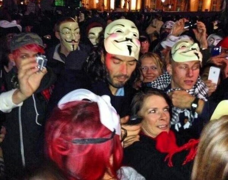 Russell brand with a mask of Guys Fawkes - who tried to destroy parliament PIC: @SpaceMonkey0000