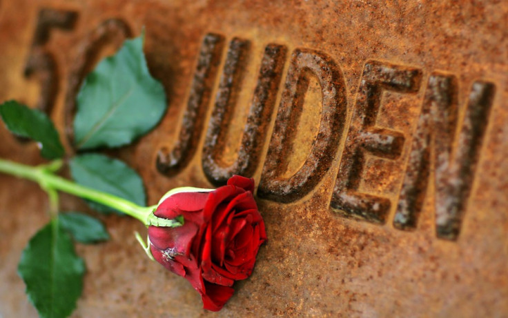 A red rose lies at Gleis 17 (platform 17) holocaust memorial at a former cargo railway station in Berlin-Grunewald, to mark the Kristallnacht, or Night of Broken Glass (Photo: Reuters)