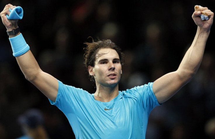 Rafael Nadal of Spain celebrates after winning his men's singles tennis match against Stanislas Wawrinka of Switzerland at the ATP World Tour Finals in London